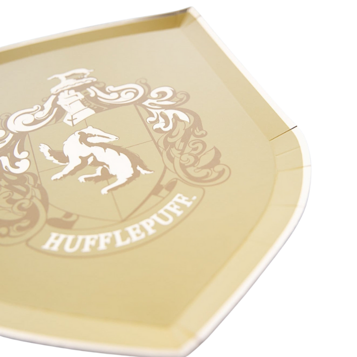Yellow Hufflepuff shield paper plate for Harry Potter birthday from Parte Haus party supply store in Bethesda MD