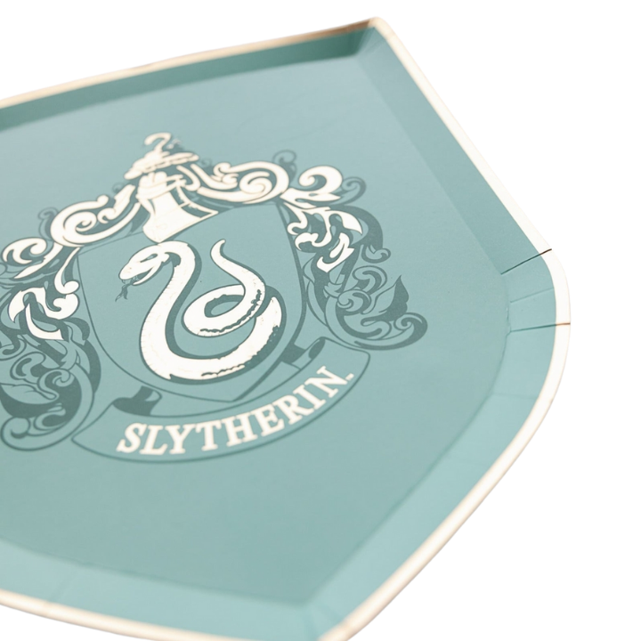 Green shield shaped plate with Slytherin snake crest for wizard theme from Parte Haus party supply store in Bethesda MD.
