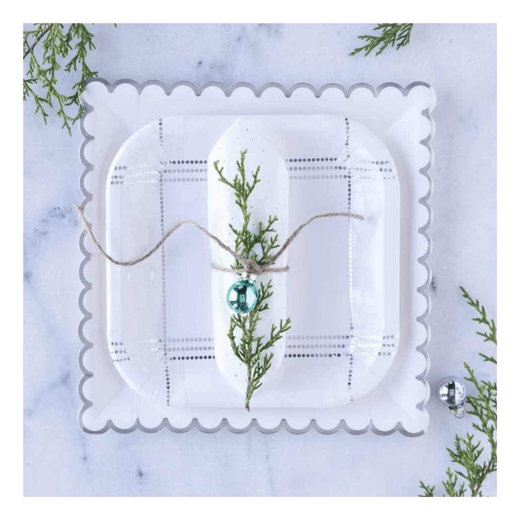 White square scalloped edge plate with plaid design for holiday table setting from Parte Haus party supply store in Bethesda MD.