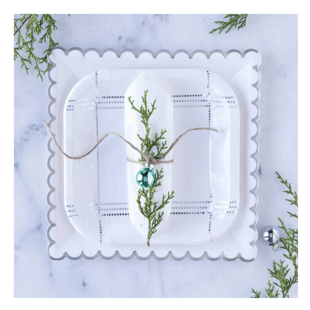 White square scalloped edge plate with plaid design for holiday table setting from Parte Haus party supply store in Bethesda MD.
