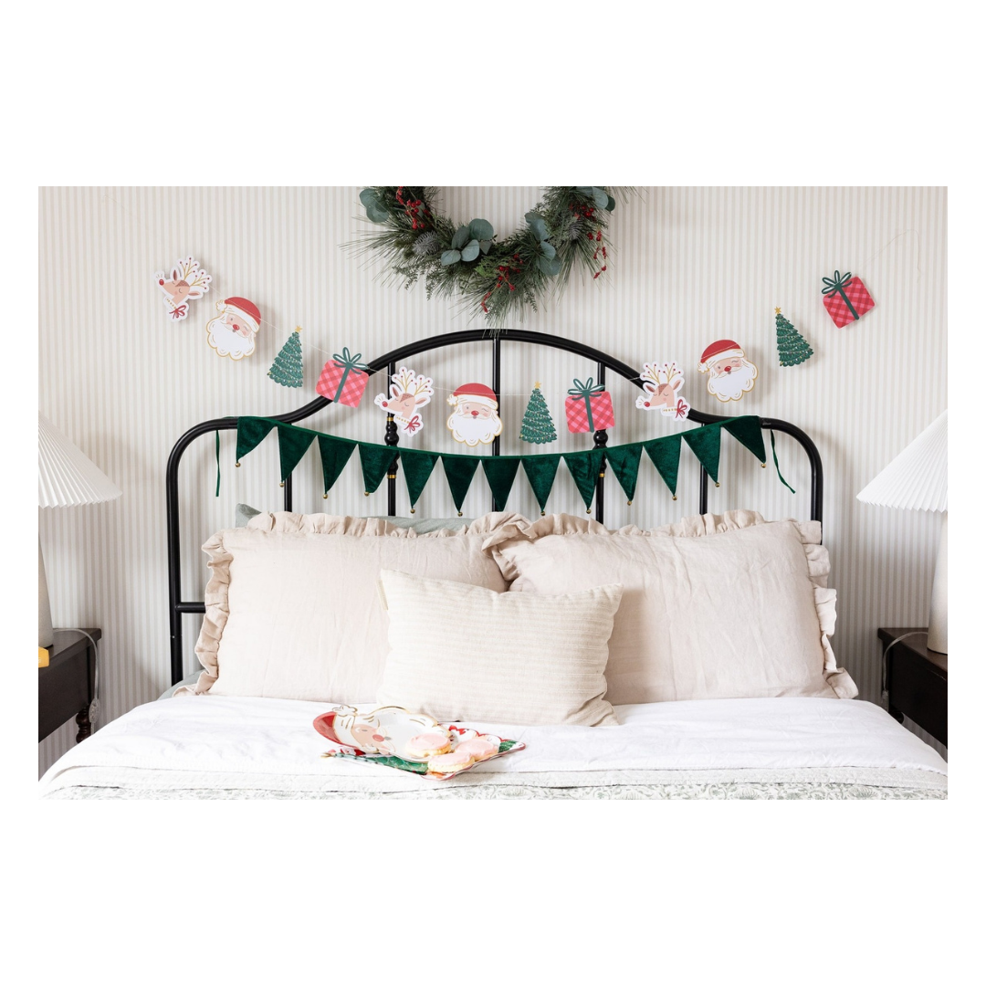 Green Christmas garland with Santa and tree designs bedroom holiday decor from Parte Haus party supply store in Bethesda MD