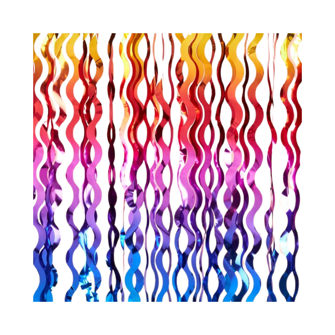 Rainbow foil wavy curtain with groovy design for birthday from Parte Haus party supply store in Bethesda MD.