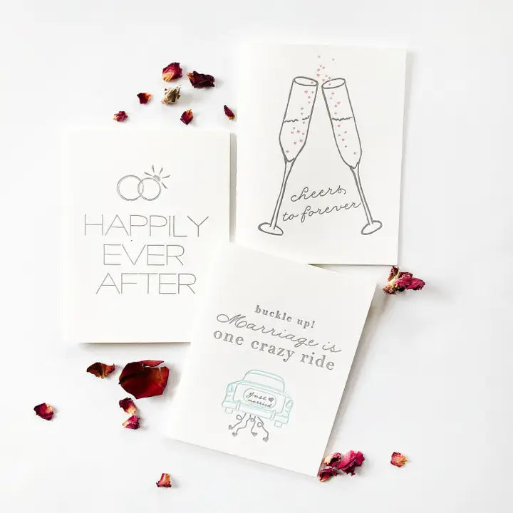 White wedding congrats card set with champagne glasses text and car from Parte Haus party supply store in Bethesda Maryland