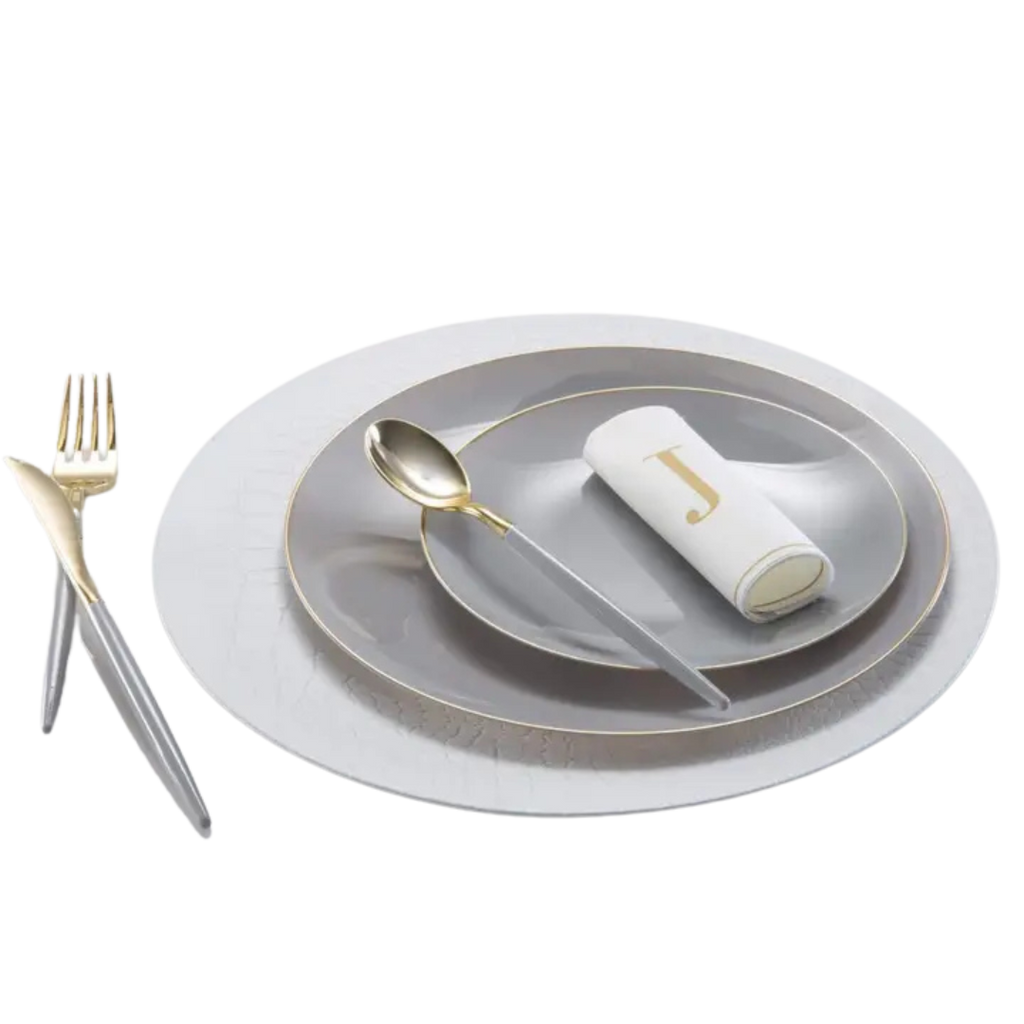 White snakeskin look round plastic charger plate elegant table setting from Parte Haus party supply store in Bethesda MD