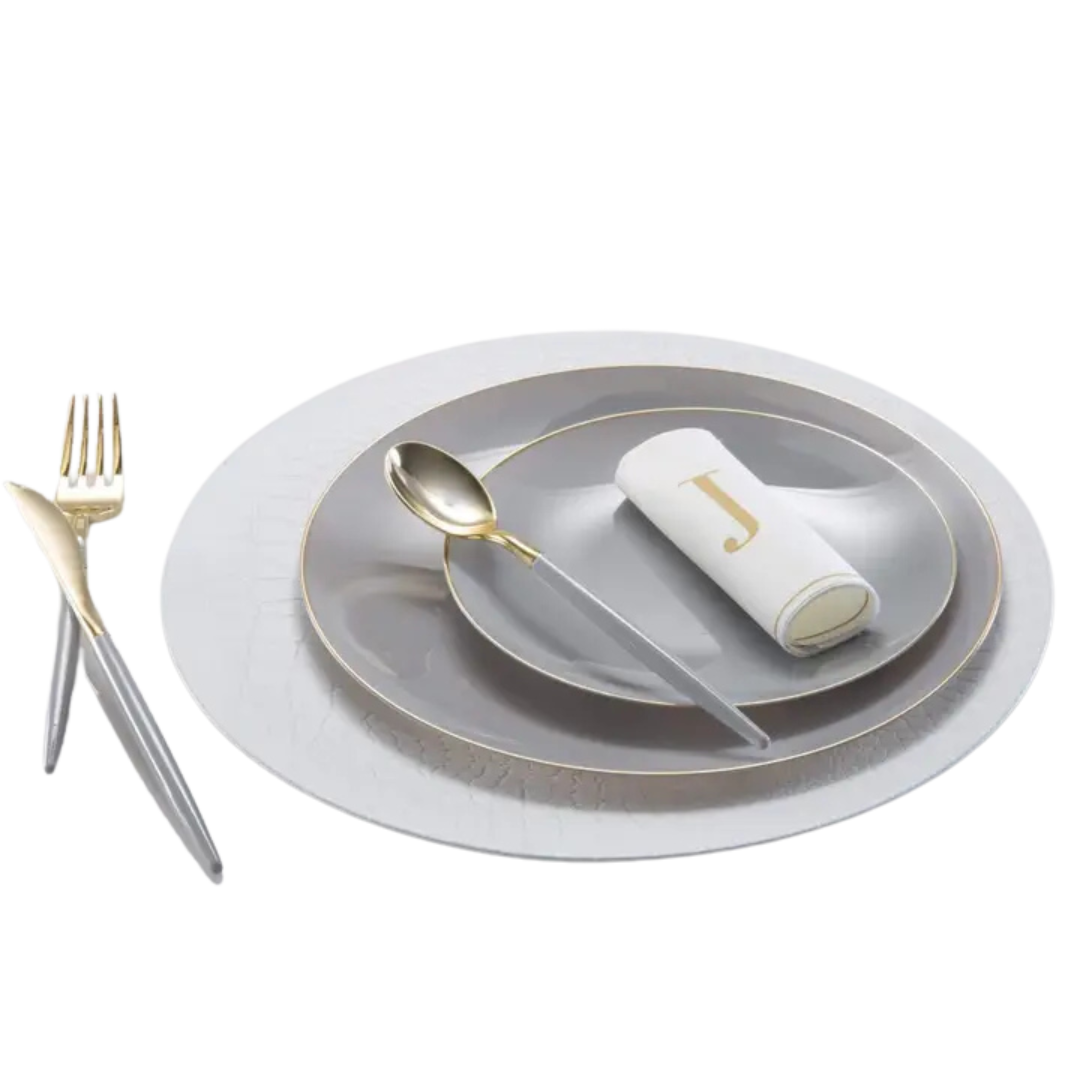 White snakeskin look round plastic charger plate elegant table setting from Parte Haus party supply store in Bethesda MD