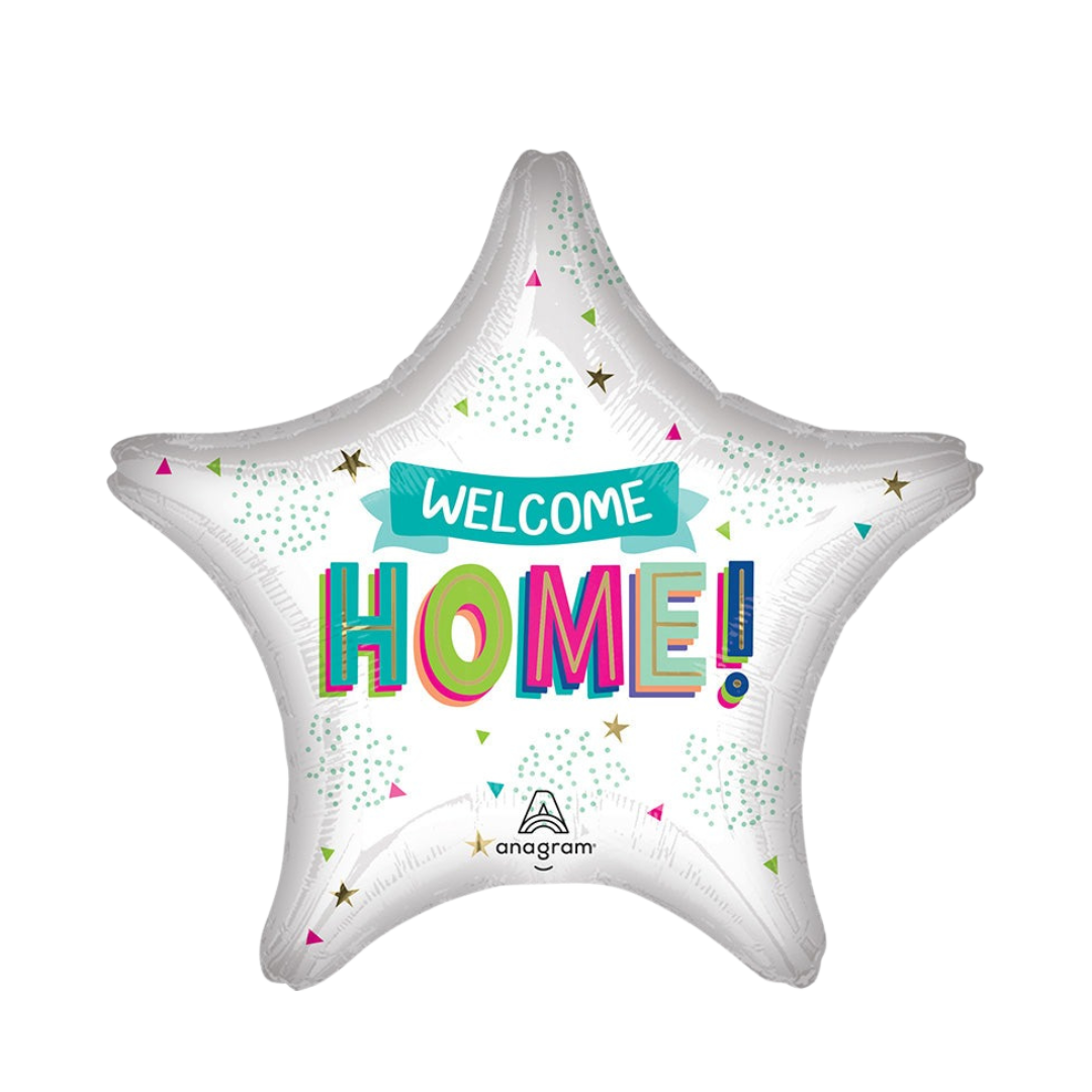 White star foil balloon with colorful Welcome Home text homecoming theme from Parte Haus party supply store in Bethesda MD