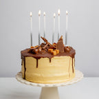 White and silver birthday candles tall elegant style for birthday from Parte Haus party supply store in Bethesda MD