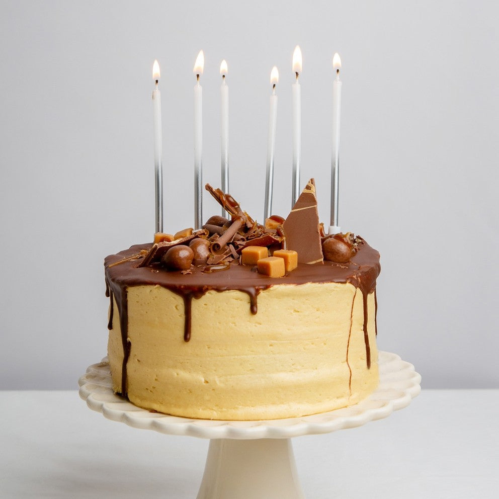 White and silver birthday candles tall elegant style for birthday from Parte Haus party supply store in Bethesda MD