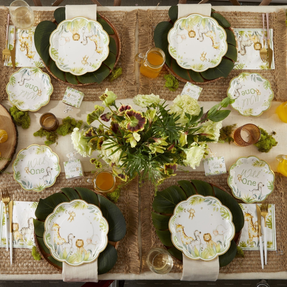 White and green scalloped baby appetizer dessert plates with safari animals birthday theme from Parte Haus party supply store in Bethesda Maryland