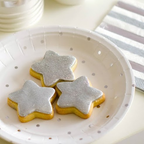 White and silver dots small appetizer dessert plate with star cookies birthday theme from Parte Haus party supply store in Bethesda Maryland