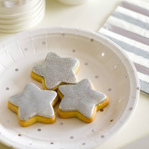 White and silver dots small appetizer dessert plate with star cookies birthday theme from Parte Haus party supply store in Bethesda Maryland