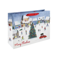 Colorful Christmas gift bag with village scene snowy streets and tree from Parte Haus party supply store in Bethesda MD