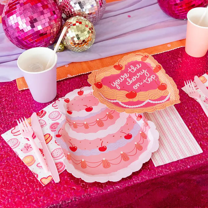 Pink cherry cake napkins with you're the cherry on top text birthday theme from Parte Haus party supply store in Bethesda MD