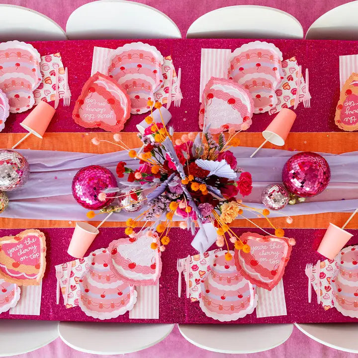 Pink cherry themed napkins and plates for birthday from Parte Haus party supply store in Bethesda MD