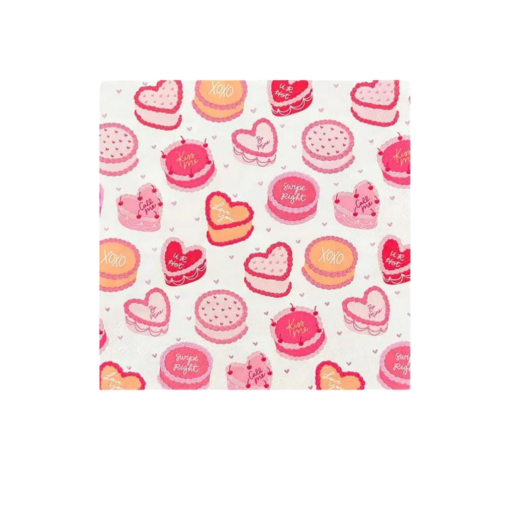 Pink and red large napkin with heart cakes and sweet sayings Valentine’s Day from Parte Haus party supply store in Bethesda MD