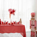 Red and white Christmas table setting with nutcracker balloon sculpture holiday theme from Parte Haus party supply store in Bethesda MD