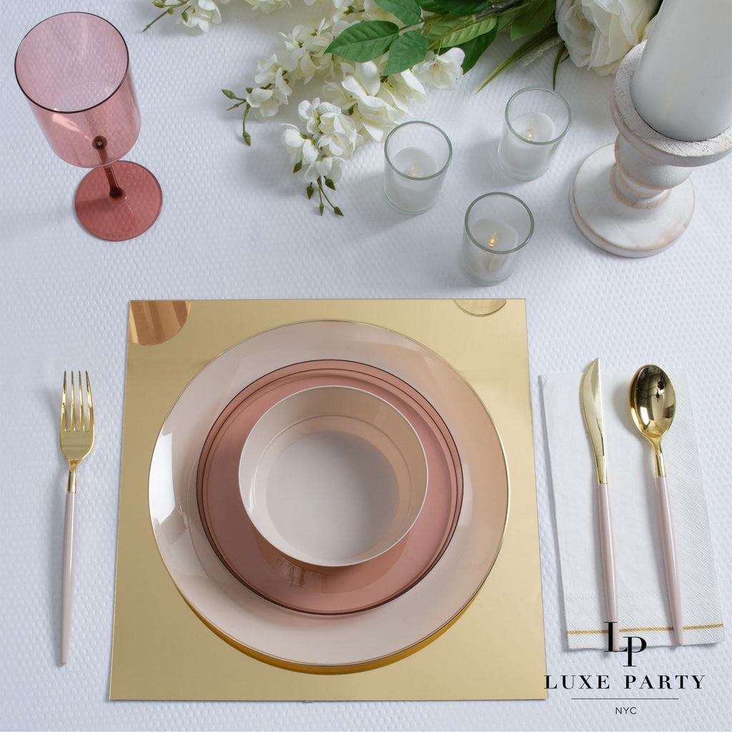 Blush pink and gold table setting with plates glass and floral decor wedding theme from Parte Haus party supply store in Bethesda Maryland