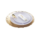 Gold and white elegant dinnerware set with rolled napkin for celebration from Parte Haus party supply store in Bethesda Maryland