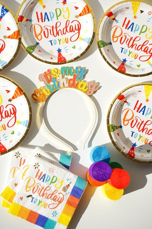 Colorful Happy Birthday plates napkins headband and confetti for birthday from Parte Haus party supply store in Bethesda Maryland