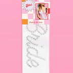 White and silver bride to be sash for bachelorette party from Parte Haus party supply store in Bethesda Maryland