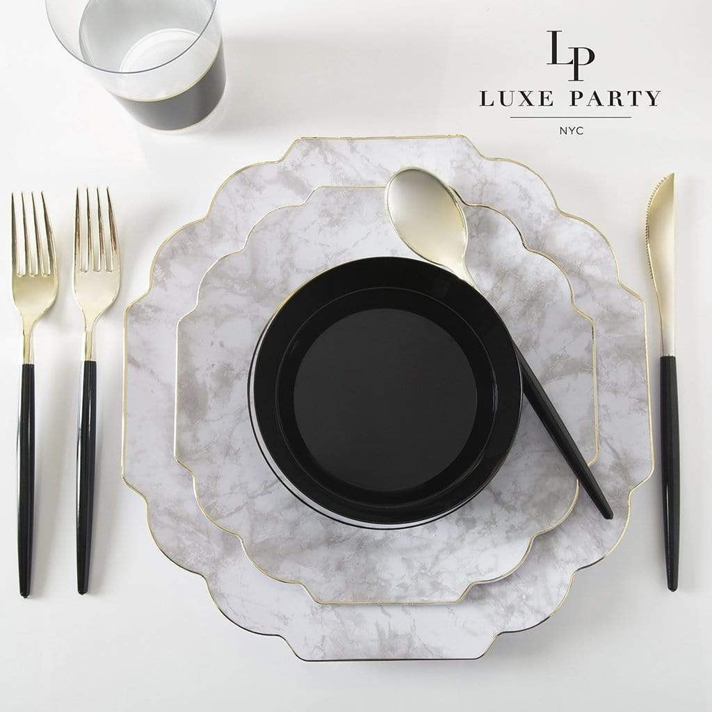 Black and marble dinnerware set with gold cutlery elegant table setting from Parte Haus party supply store in Bethesda Maryland