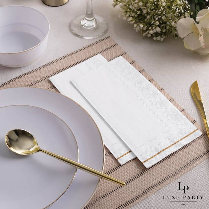 White and gold napkins elegant table setting for wedding from Parte Haus party supply store in Bethesda Maryland