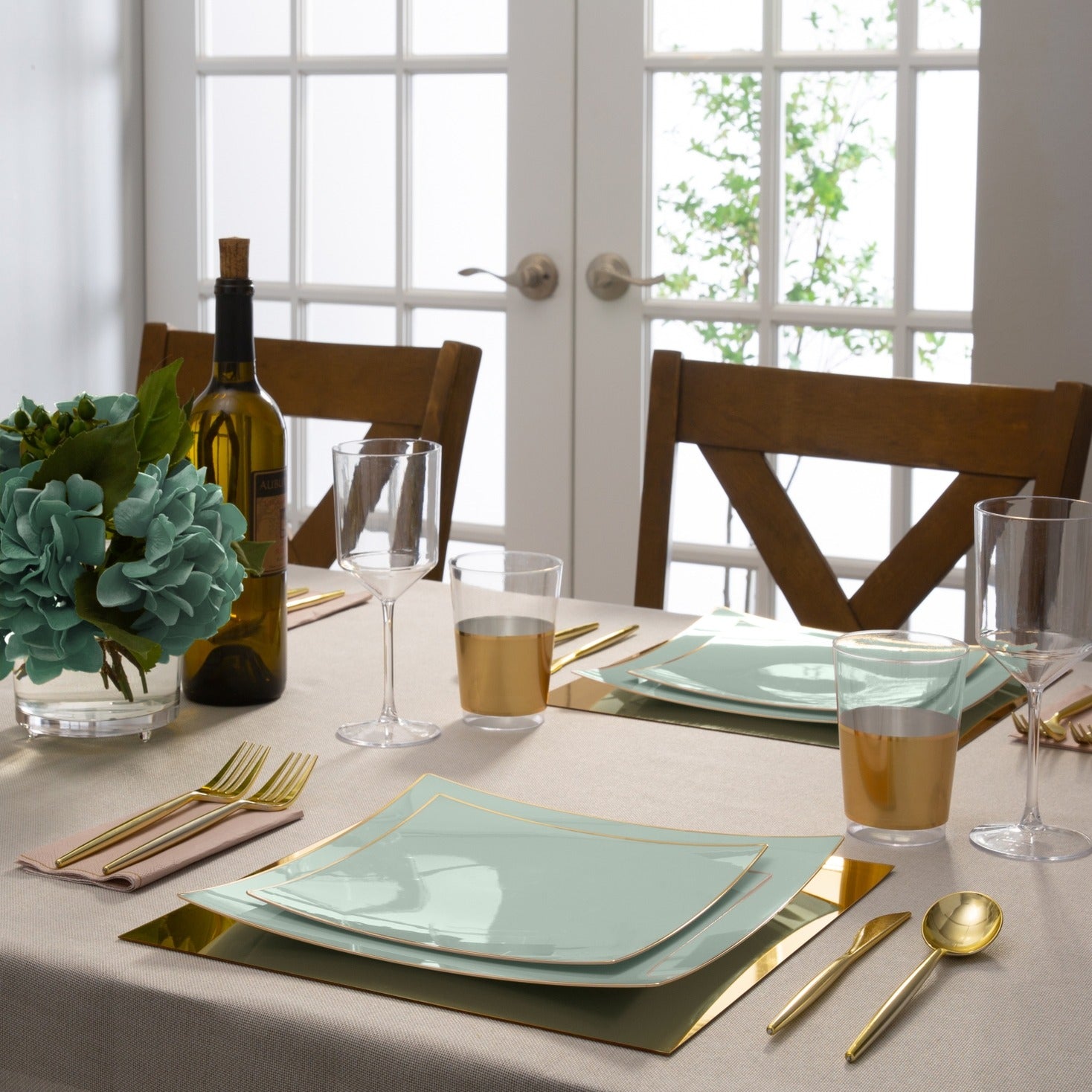 Mint green square plates gold cutlery elegant dinnerware for celebration from Parte Haus party supply store in Bethesda MD
