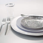 Silver and clear plastic dinnerware set with geometric design for elegant event from Parte Haus party supply store in Bethesda MD