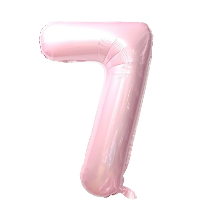Baby pink 34in number 7 foil balloon for birthday parties – from Parte Haus party supply store in Bethesda, Maryland.