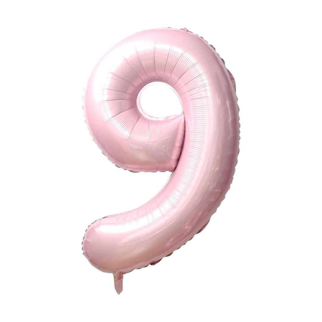 Baby pink 34in number 9 foil balloon for birthday parties – from Parte Haus party supply store in Bethesda, Maryland.