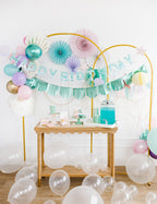 Pastel mermaid birthday decorations with balloons and banners under the sea theme from Parte Haus party supply store in Bethesda MD