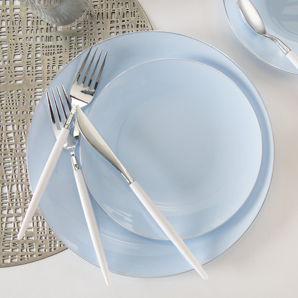 Light blue dinnerware set with white handled cutlery modern metallic placemat event from Parte Haus party supply store in Bethesda MD