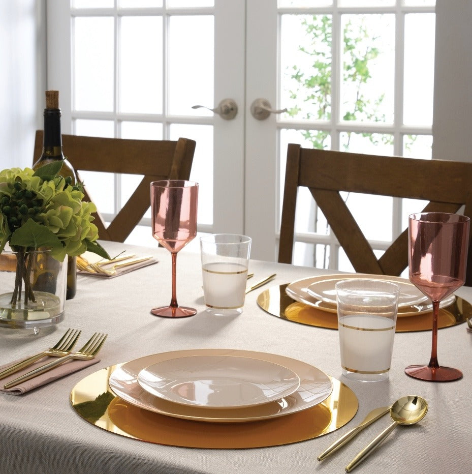 Gold and blush tableware elegant dining setup celebration theme from Parte Haus party supply store in Bethesda MD