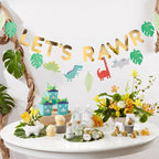 Colorful dinosaur birthday banner and table decor dinosaur theme from Parte Haus party supply store in Bethesda Maryland