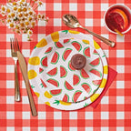 Red and yellow watermelon paper plates summer picnic table from Parte Haus party supply store in Bethesda MD