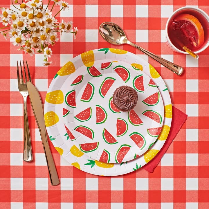 Red and yellow watermelon paper plates summer picnic table from Parte Haus party supply store in Bethesda MD