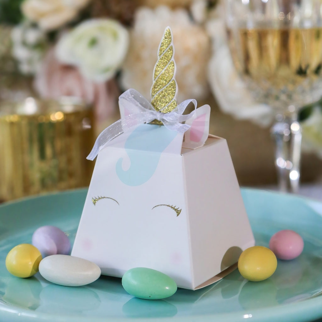 White unicorn party favor box with gold horn and pastel candies birthday theme from Parte Haus party supply store in Bethesda Maryland