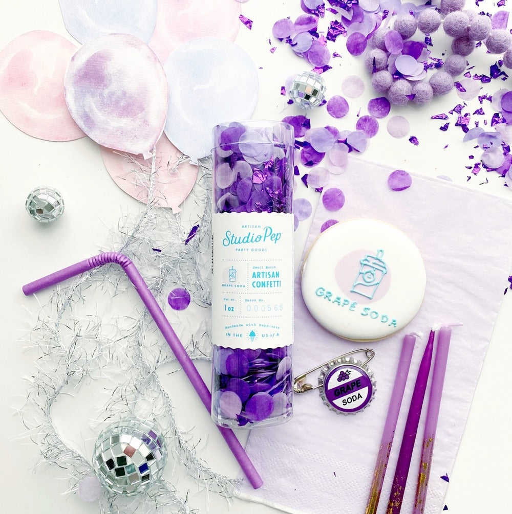 Purple artisan confetti Grape Soda themed celebration decor for birthday from Parte Haus party supply store in Bethesda Maryland