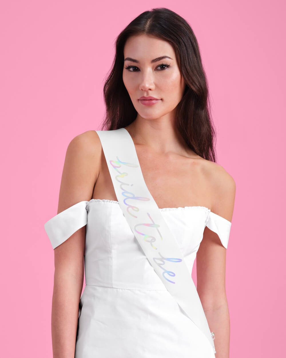 White bride to be sash with iridescent lettering bachelorette accessory from Parte Haus party supply store in Bethesda Maryland