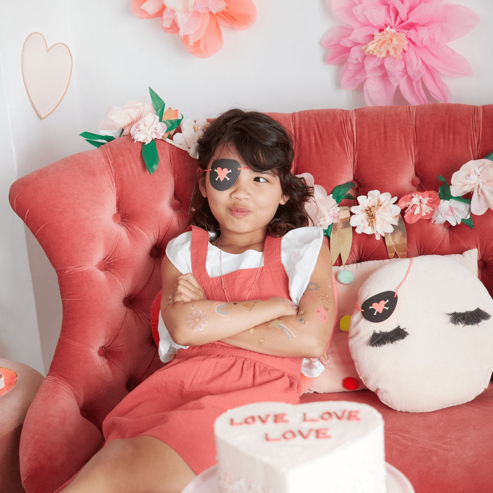 Pink kids eye patch and floral themed birthday decor for girls from Parte Haus party supply store in Bethesda Maryland