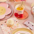Pink and yellow flower paper plate pastel drink cup with cherry decor fun birthday theme from Parte Haus party supply store in Bethesda Maryland