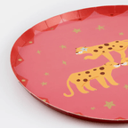 Red plate with cheetah illustration and gold stars jungle theme from Parte Haus party supply store in Bethesda Maryland