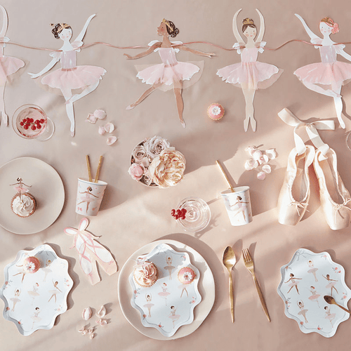 Pink ballerina themed plates cups napkins and ballet shoes for birthday from Parte Haus party supply store in Bethesda MD