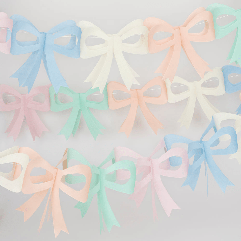 Pastel paper bow garland decoration pastel party theme from Parte Haus party supply store in Bethesda MD