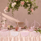 Pink and white birthday table decor with floral centerpiece and cake from Parte Haus party supply store in Bethesda Maryland