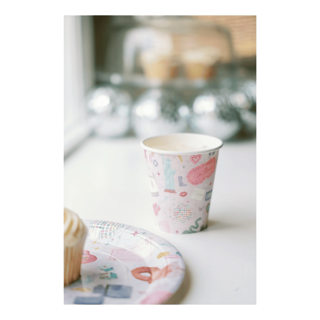 Pastel custom illustrated paper cup and plate with cupcake birthday theme from Parte Haus party supply store in Bethesda MD