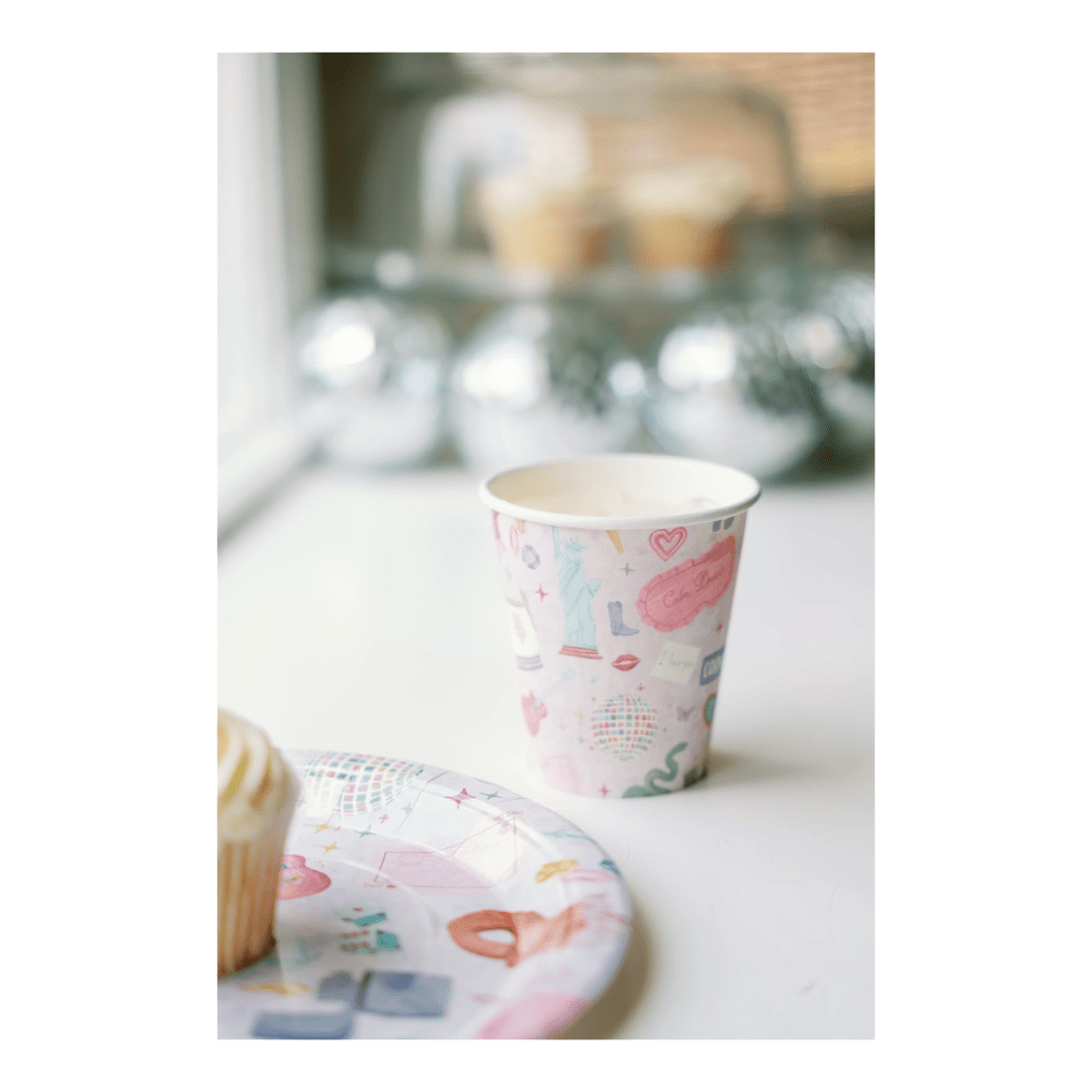 Pastel custom illustrated paper cup and plate with cupcake birthday theme from Parte Haus party supply store in Bethesda MD