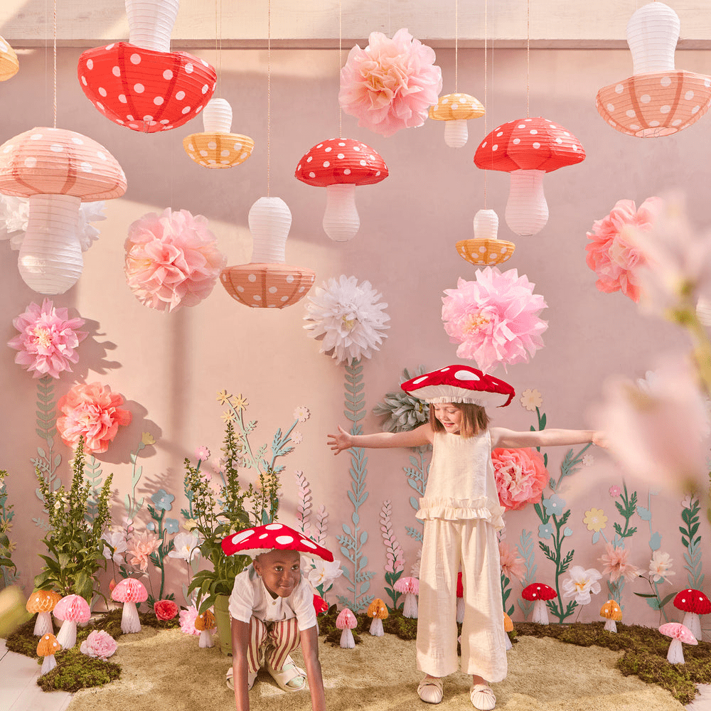 Red and beige mushroom shaped hanging decorations whimsical kids birthday from Parte Haus party supply store in Bethesda Maryland