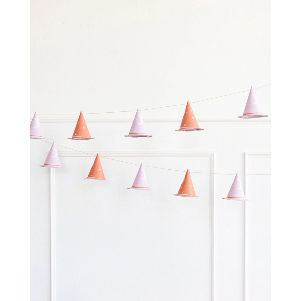 Pink and orange witch hat garland Halloween decor from Parte Haus party supply store in Bethesda Maryland
