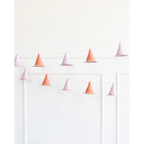 Pink and orange witch hat garland Halloween decor from Parte Haus party supply store in Bethesda Maryland